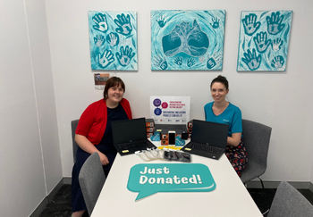 Engagement Officer Danni with Telulah from QDN with some of the doanted digital devices